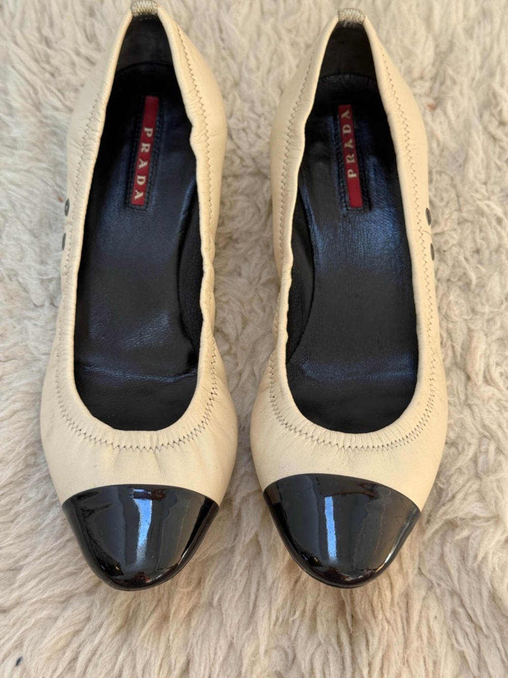 ✨ PREOWNED ✨💯% AUTHENTIC Prada Leather Ballet Flats with Black Patent Cap Toe